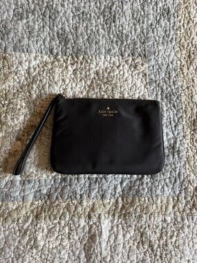 kate spade black leather wristlet pouch with gold logo